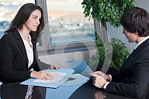 Two businesspeople negotiating