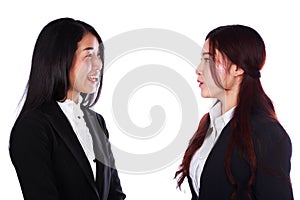 Two businesswoman talking together isolated on white background