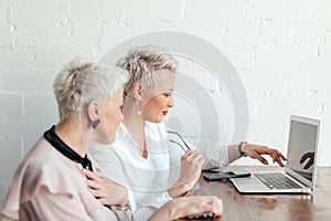 Two businesswoman using laptop in morning. Business, financial People and lifestyles