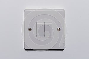 two button switch on a white wall 2