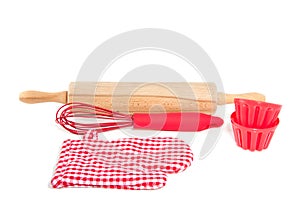 Two cake molds with kitchen tools photo