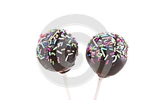 Two cakepops with colored decoration