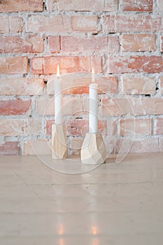 Two candlelights on table