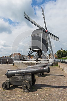 Two cannons and mill