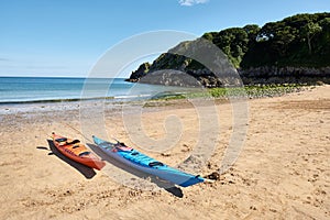two canoes, Barafundle Beach,Bay near Stackpole,Pembrokeshire,Wales,U.K