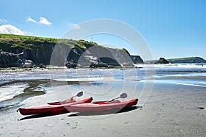 two canoes on the beach