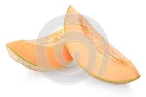 Two cantaloupe melon slices on white