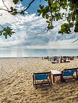 Two canvas bed on beach in cloudy day, Samui, Thailand