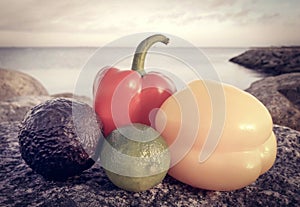 Two capsicums with lemon and avocado