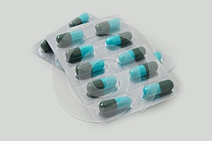 Panel of capsules medicine pills from doctor order photo