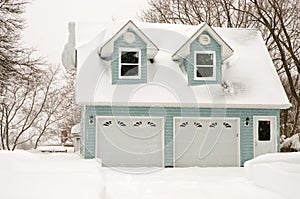 Two car garage in snowstorm