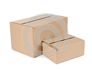 Two cardboard parcel boxes isolated on white