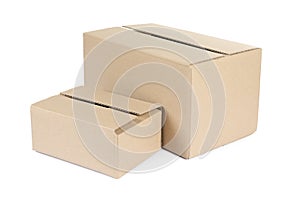 Two cardboard parcel boxes isolated on white