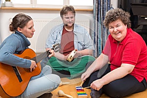 Two caretaker and a mentally disabled woman