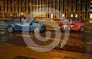 Two cars accident on the road on city location at night time