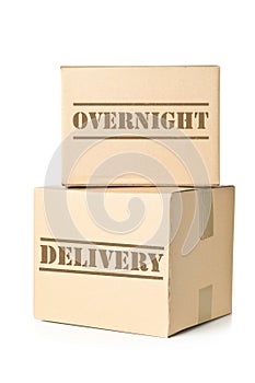 Two carton parcels with Overnight Delivery imprint