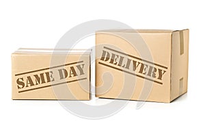 Two carton parcels with Same Day Delivery imprint photo