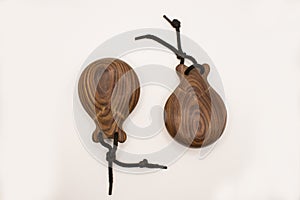 Two castanets are on a white background