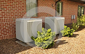 Two central air conditioning units photo