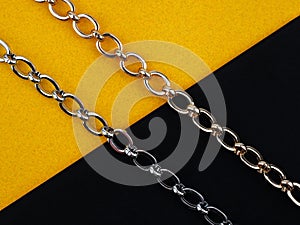 Two chains on black yellow background
