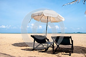 Two chair and umbrella on the beach