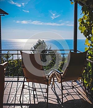 Two chairs on the balcony.  Amazing sea view