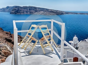 Two Chairs On A Quiet Balcony