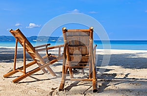 Two chairs on sand beach in Boracay, Philippines