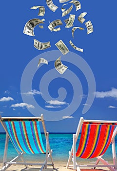 Two chairs standing on the sandy beach