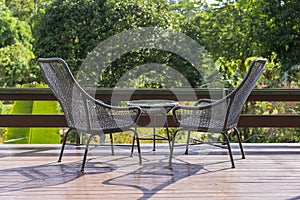 Two chairs and table on the backyard in tropical garden with beautiful view in island Borneo, Malaysia