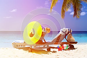 Two chairs on the tropical sand beach