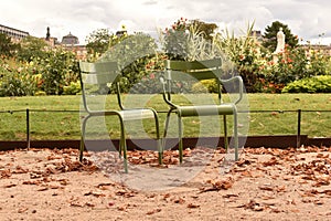 Two chairs in the Tuileries garden in Paris