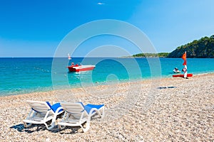 Two chaise lounges on the beach in Kemer, Turkey