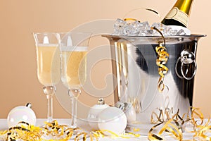 Two Champagne flutes and ice bucket