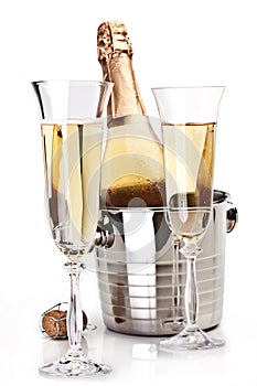 Two champagne glass with bottle.