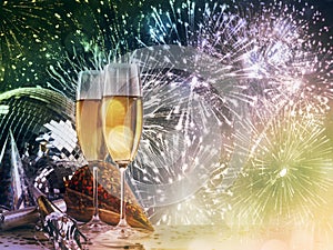 Champagne glasses against New Year celebrations photo