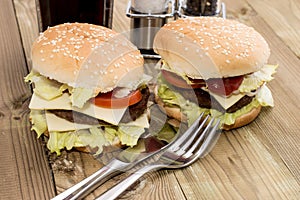 Two Cheeseburger on wooden background