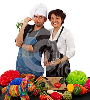 Two chefs preparing for a celebration