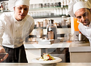 Two chefs working as a team