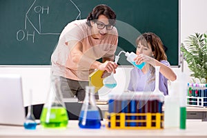 The two chemists students in classroom