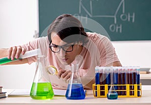 Two chemists students in classroom