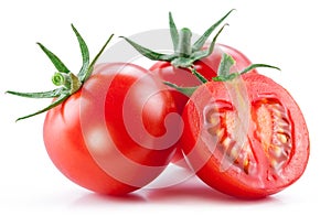 Two cherry tomatoes and a cross section of tomato. White background.