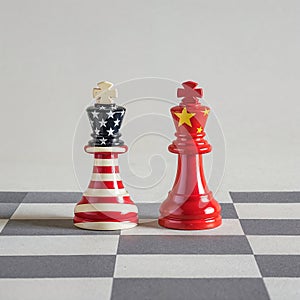 Two chess pieces featuring USA and China flags.
