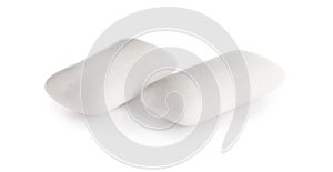 Two chewing gum pieces on white background