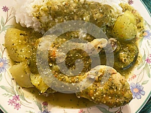 Two Chicken Legs With Potatoes, Squash, White Rice and Tomatillo Salsa