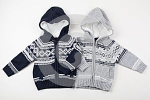 Two child warm vests, sweaters with hoods