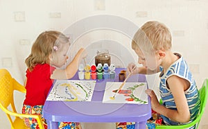 Two children draw photo