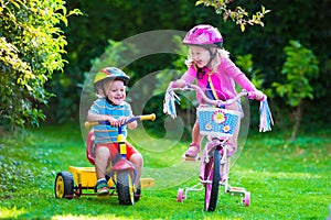 Two children riding bikes