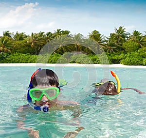 Two children snorkeling