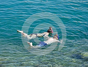 Two children snorkelling, Sissi.